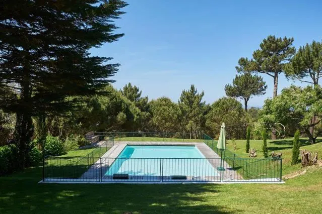 Fenced private pool in the garden at Villa Rio Seco, Sintra