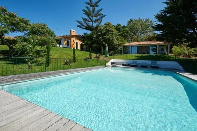 The pool and the house at Villa Rio Seco, Sintra